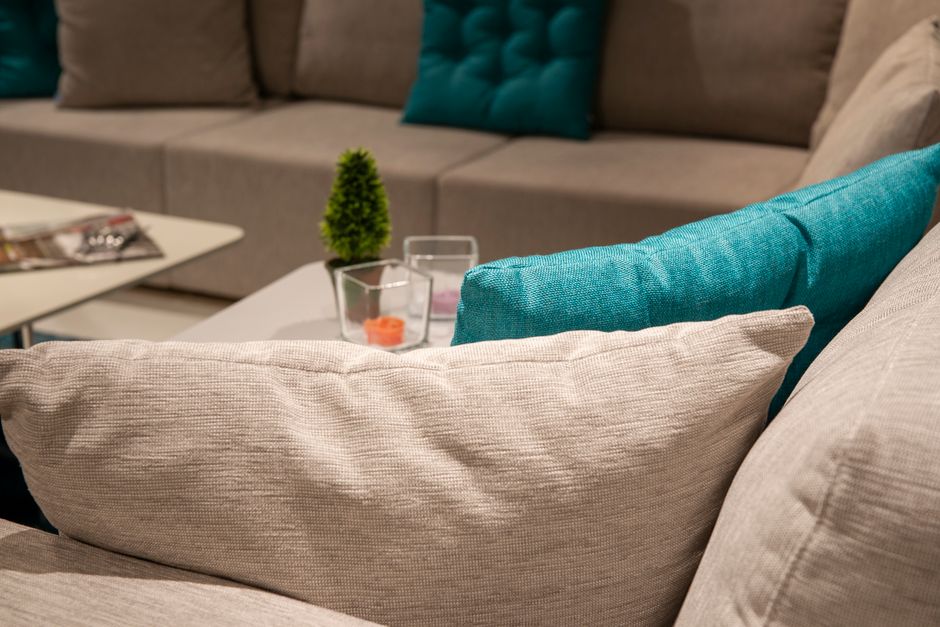 Careful upholstery cleaning of a modern fabric sofa